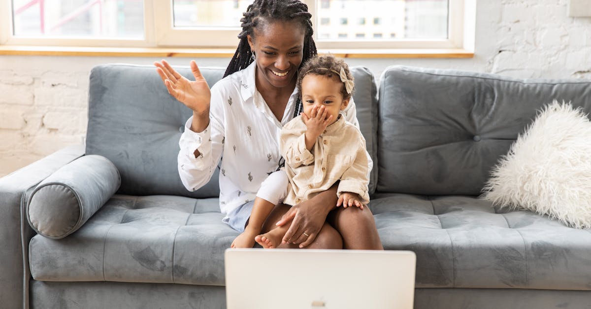 A pediatric SLP providing online parent coaching for speech therapy via a video call.