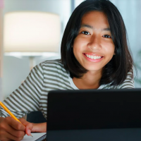 girl homework laptop